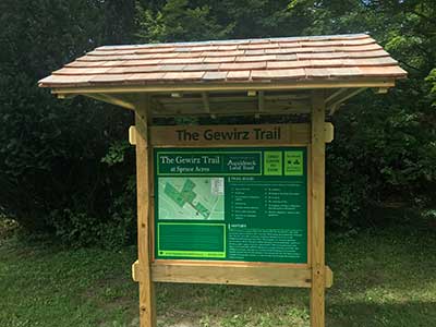 A Trailhead Kiosk at Spruce Acres Farm, located just beyond the outbuildings at the site.